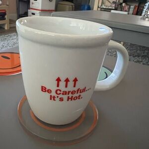 Bodum White Mug with Red Warning Text